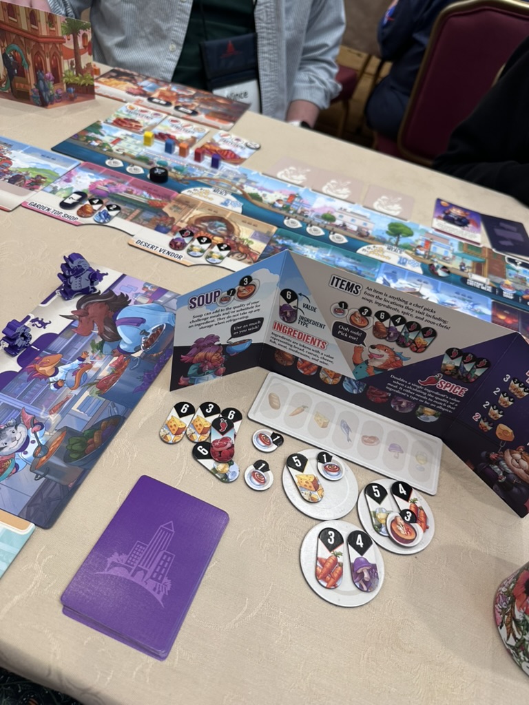 Critter Kitchen board game with food tokens