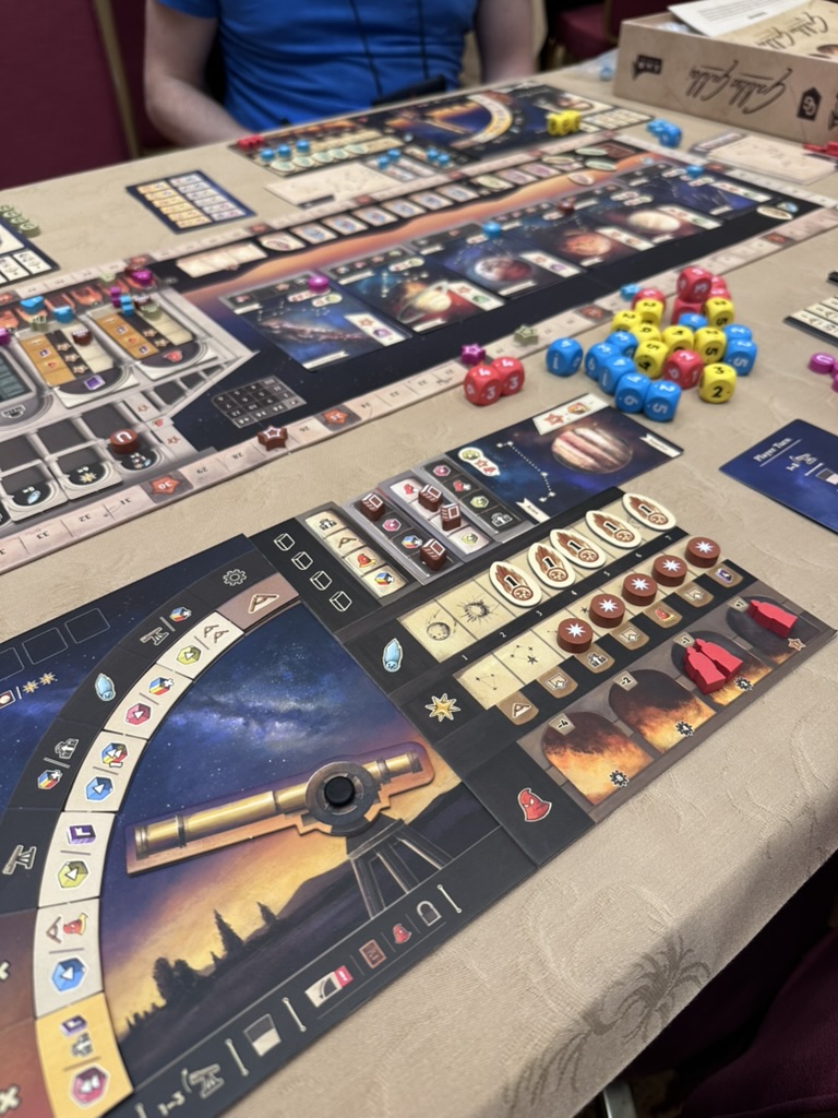 Galileo Galilei board game with a telescope and dice